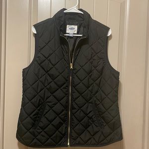 Old Navy black quilted vest with gold zipper.